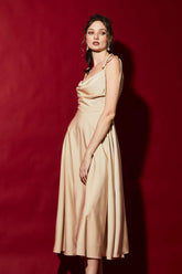 Sleeveless silk midi dress with draped cowl neckline and adjustable shoulder tie straps